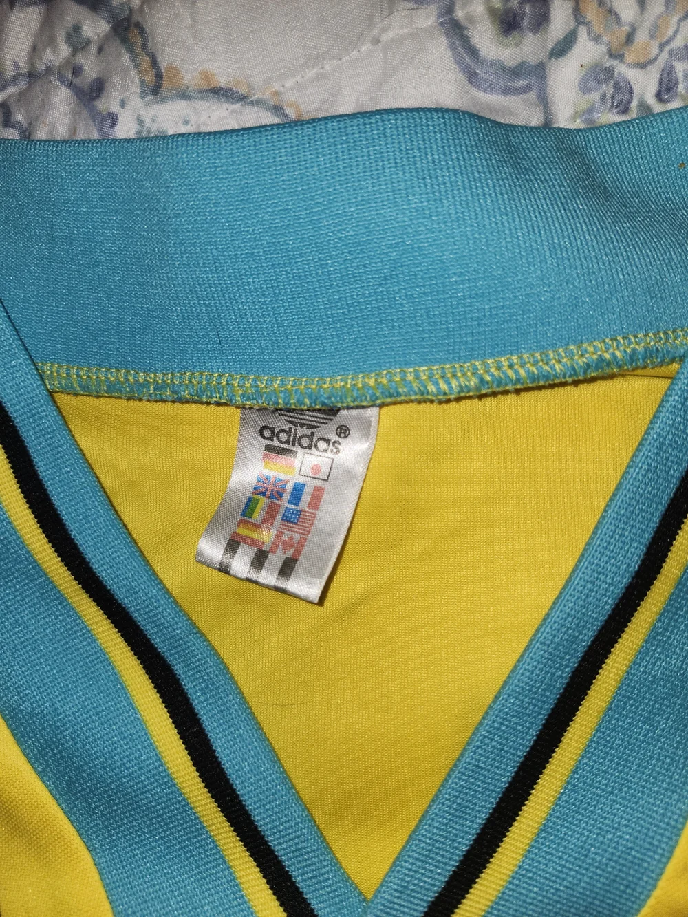 adidas Yellow Soccer Jersey with Blue and Black Stripes and Opel Logo